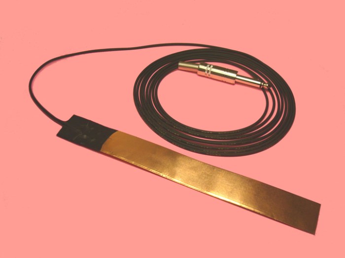 This is a contact microphone with a PVDF film tab from Cold Gold Audio.